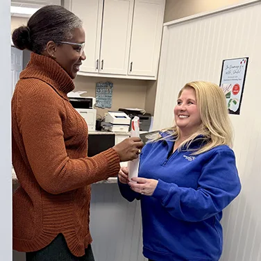 Dawn with a patient at Singing River Dentistry.