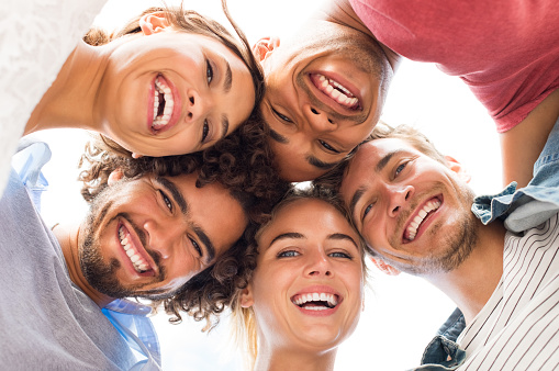 group of young college students without tooth tattoos taking a selfie